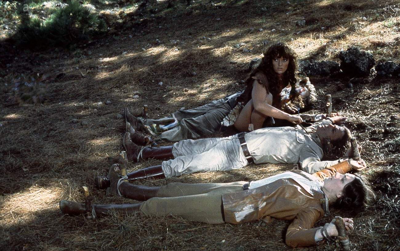 Dana Gillspie with Kevin Connor and Douglas Patrik in the movie ‘The People That Time Forgot’, 1977.