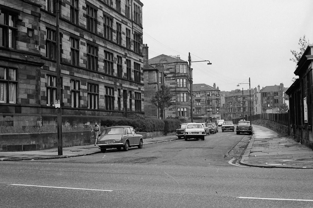 #13 Looking northwards along Alexandra Park Street, from Alexandra Parade, past Ballindalloch Drive on the left towards Roebank Street with Staffa Street on the right of frame.