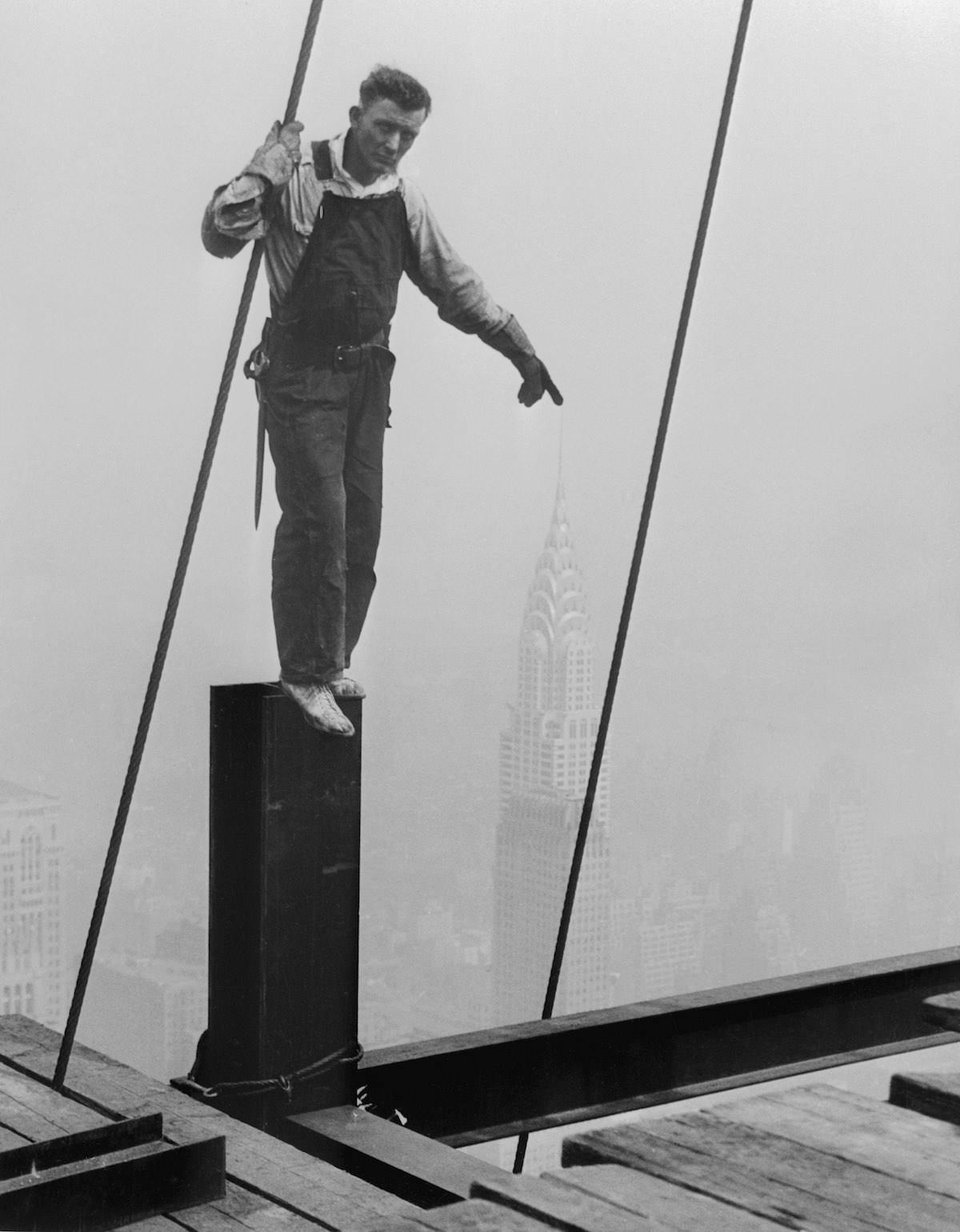 #14 An odd photographic trick placed this steelworker’s finger on the lofty pinnacle of the Chrysler Building.