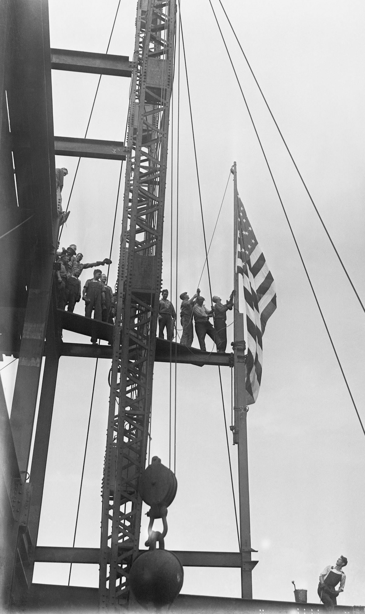 #20 Workmen at the new Empire State building that is being erected on the site of the old Waldorf Astoria Hotel at 34th Street and 5th Avenue.