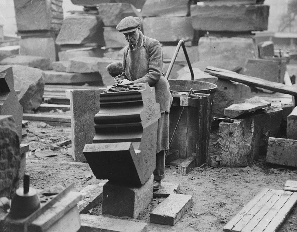 #74 A stonemason working on a detail of the Anglican Cathedral, Liverpool.