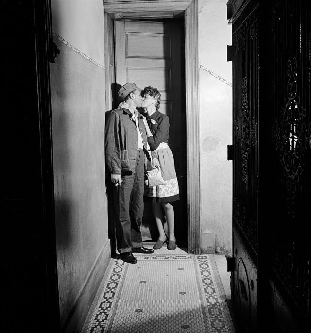 #11 A couple kissing in the hallway, 1942.
