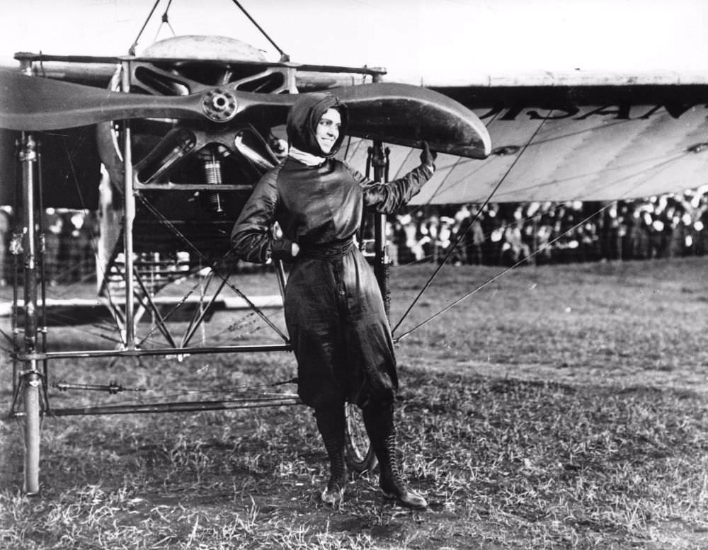 #6 Harriet Quimby in front of the Bleriot when she became the first woman to fly across the English Channel