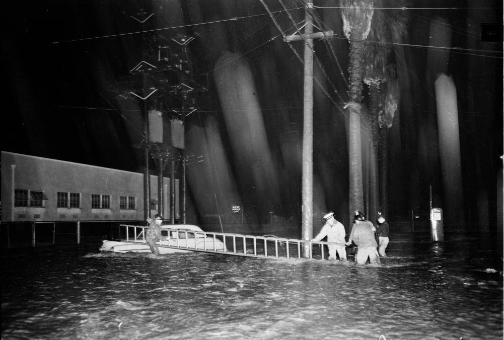 #3 General view of flooded traffic at Van Nuys and Aetna, Van Nuys. 18 January 1952.