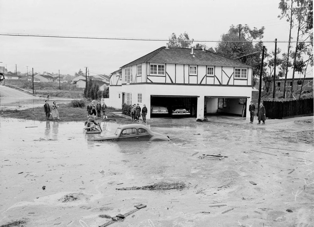 #28 People in a boat near a drowned car in Van Nuys. 15 November 1952.