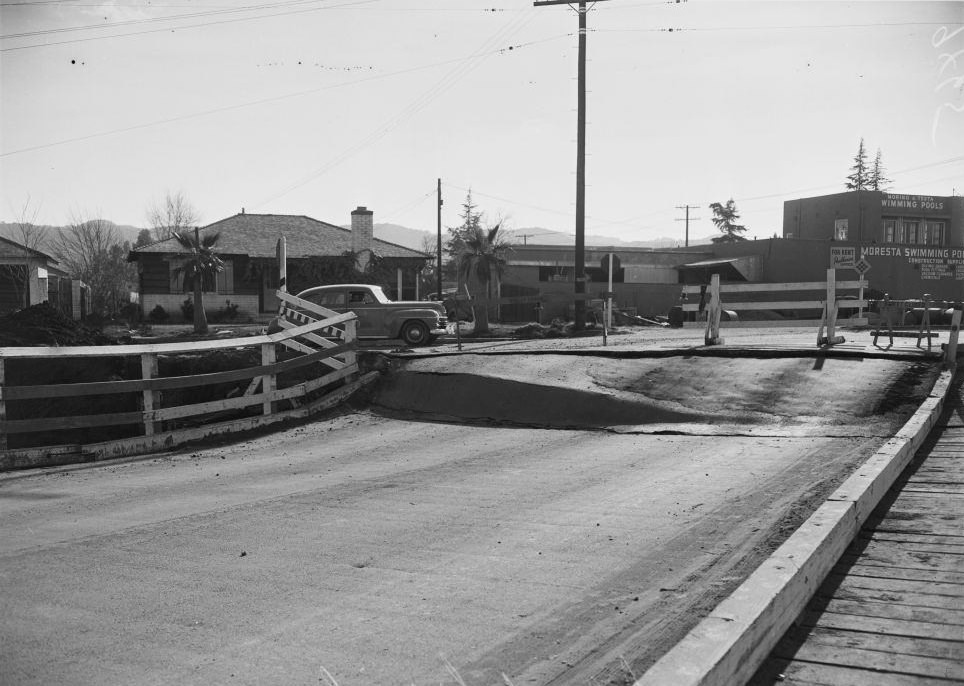 #31 Van Nuys Boulevard bridge which sank three feet at south end due to washing away of earth foundation. January 1952.