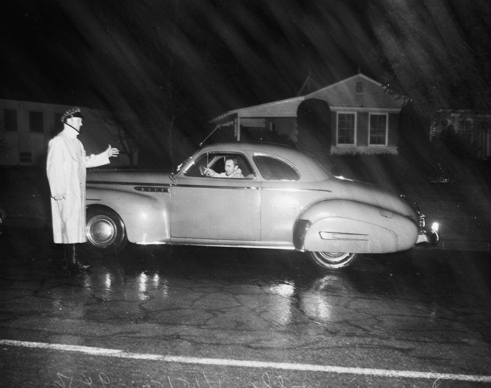 #37 Police stopping cars at Beverly Glenn Blvd. 15 January 1952.