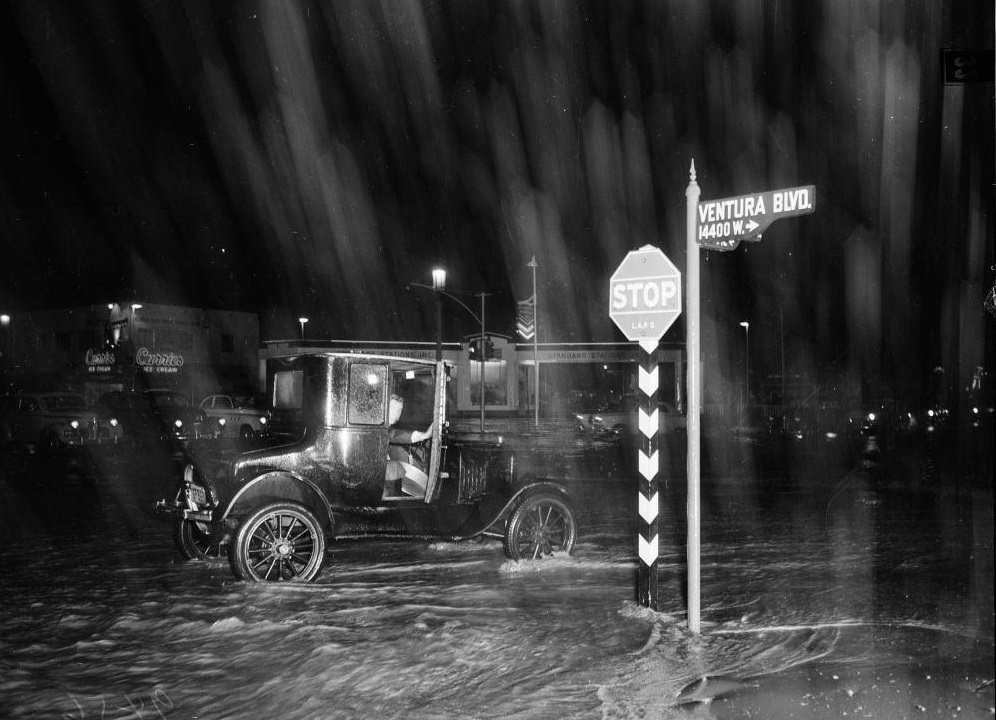 #38 Model T Ford at intersection of Van Nuys and Ventura Blvd. 15 January 1952.