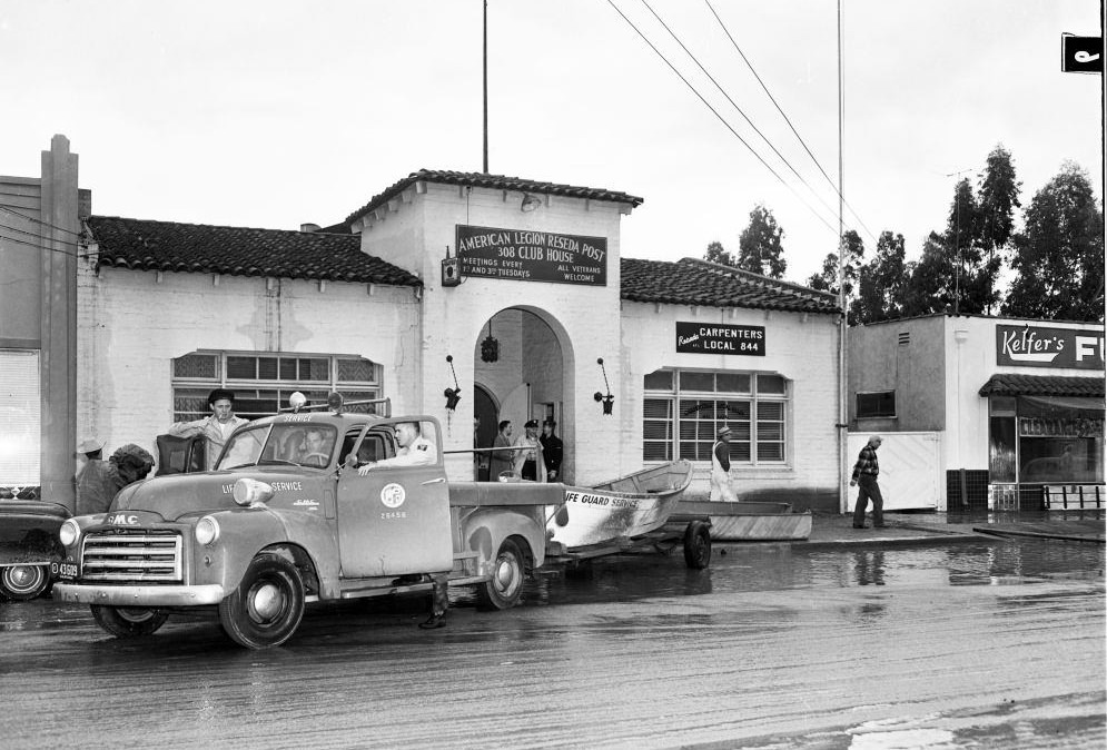 #18 A life guard service truck along with boat to rescue the victims, Van Nuys. 18 January 1952.