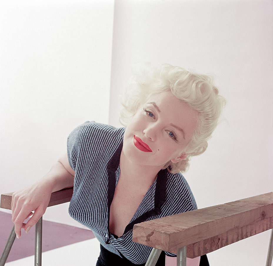 #14 Milton Greene took this image in his daylight studio, a converted barn at his home in Weston, Connecticut, December 1955.