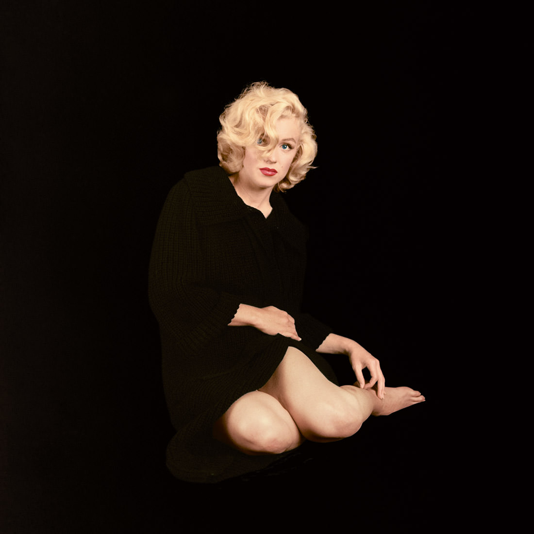 #6 This photo of Monroe wearing a sweater coat was taken by Greene during their first sitting for Look magazine in September 1953.