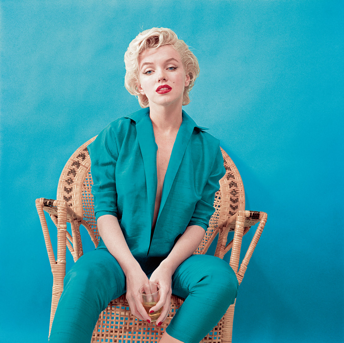 #7 Monroe wears a jacket and matching trousers for a studio shoot in March 1955. This retro style became a signature look for her.