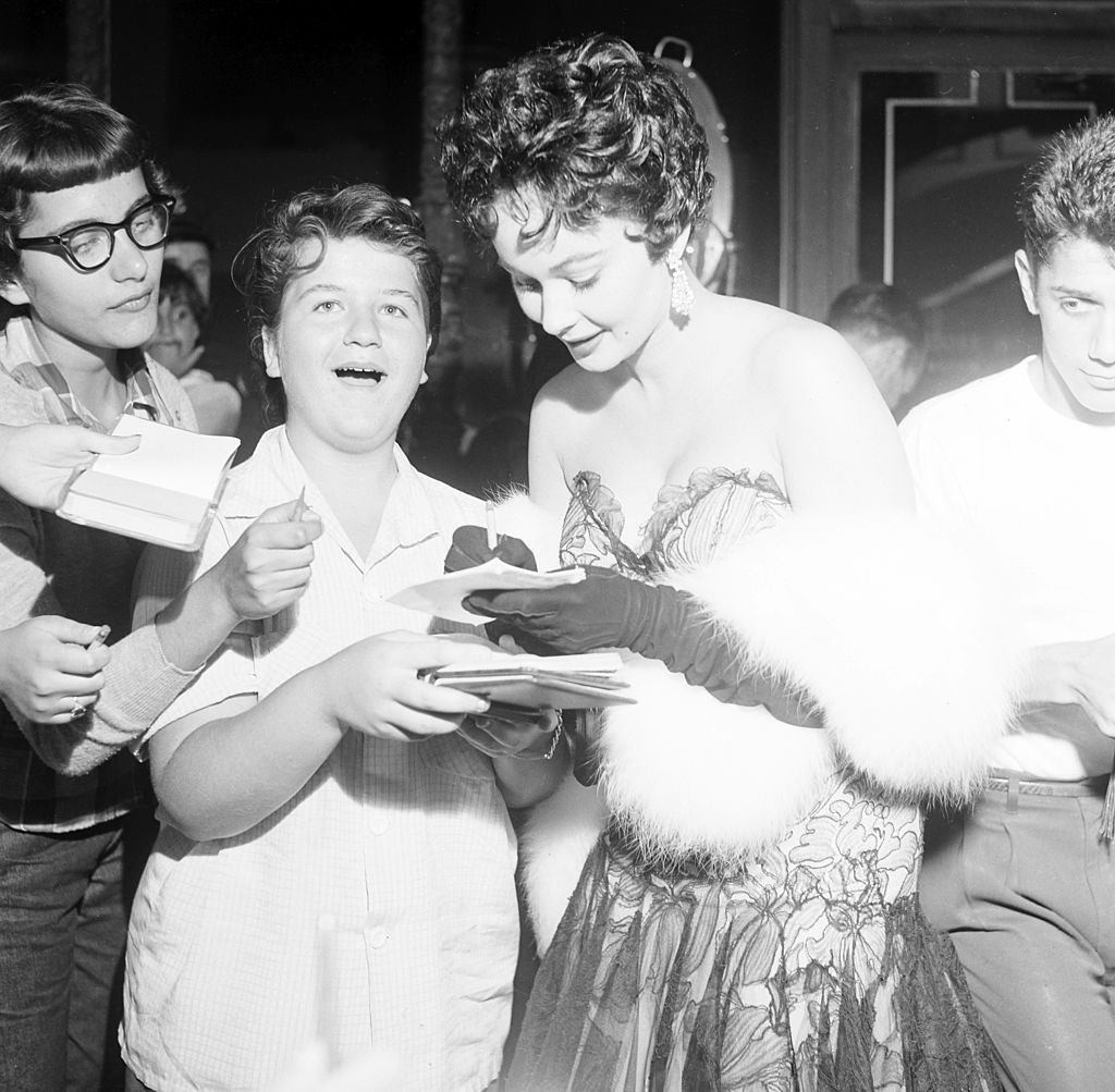 #3 Marla English signs autographs for fans in Los Angeles, 1954.