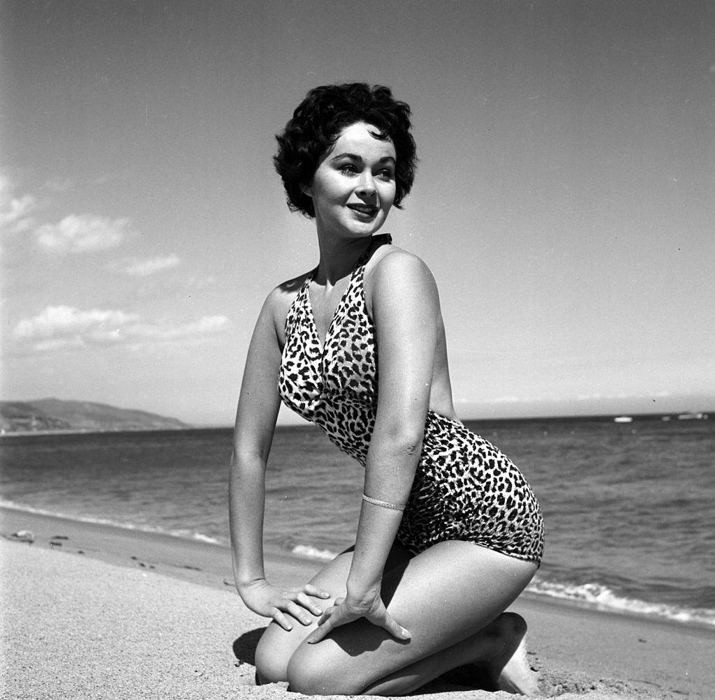 #13 Marla English poses at the beach in Los Angeles, 1954.