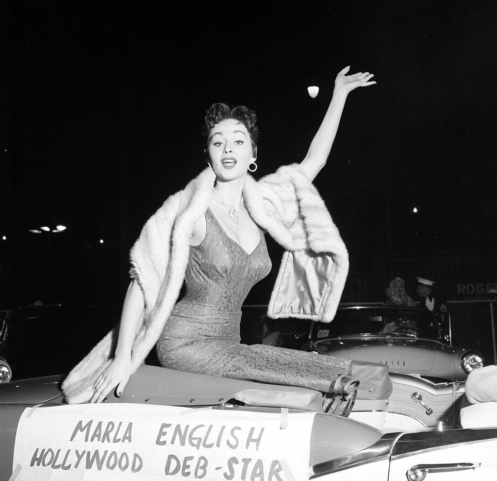 #29 Marla English waves as the Hollywood Deb-Star in Los Angeles, 1955.
