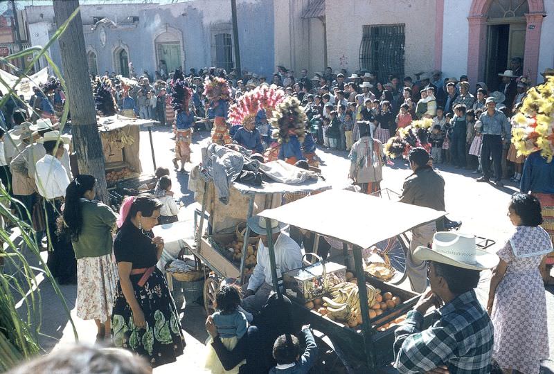 #37 Dancers, vendors, and crowd at Festival of Guadalupe, Saltillo. December 1958