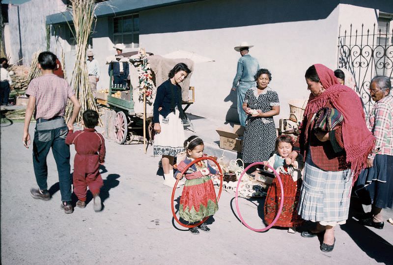 #40 Mexican children with hula hoops, Saltillo. December 1958