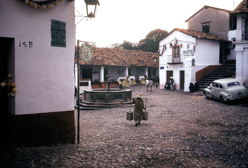 #50 Water carrier, Taxco. December 1958