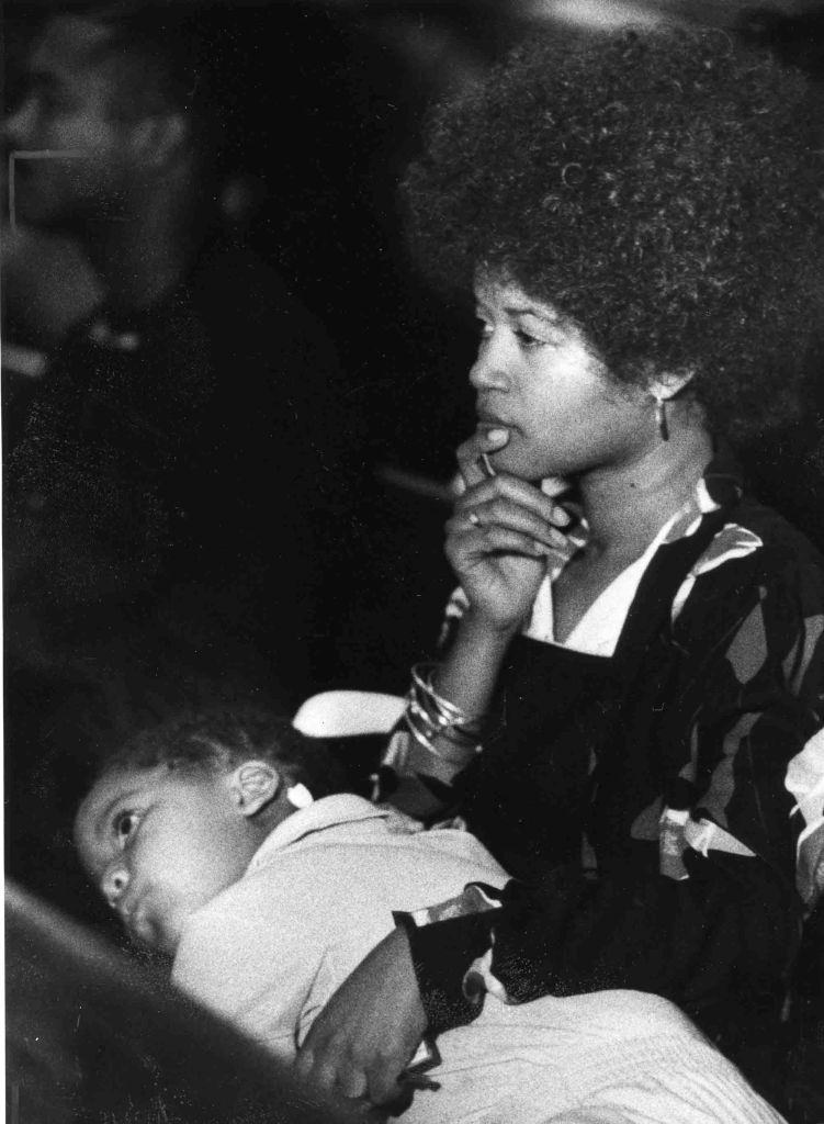 #4 Lorraine Bond, a lifelong resident of Osage Avenue, and her daughter, Chantee, attend a service at Saint Carthage Church in Philadelphia on May 19, 1985.