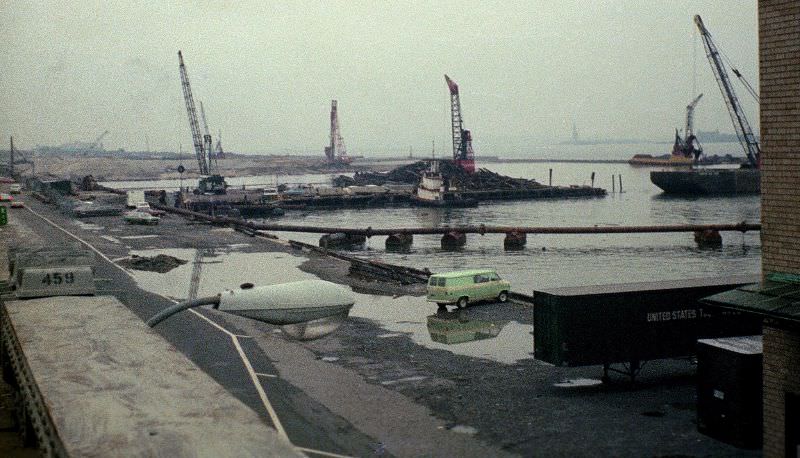 #25 Battery Park City being created from soil dug out to build the World Trade Center, Statue of Liberty in the distance,March 1974