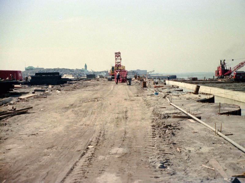 #26 Battery Park City landfill edge by Hudson being constructed looking south to Pier A, 1974