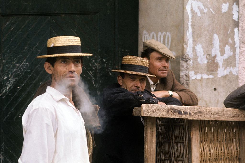 #58 Hammock-bearers smoking during a break. Madeira, 1971