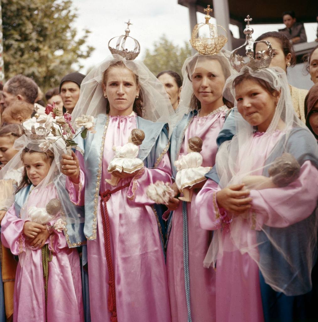 #12 Costumed young women during the procession of a religious festival in the province of Minho, circa 1970, Portugal.