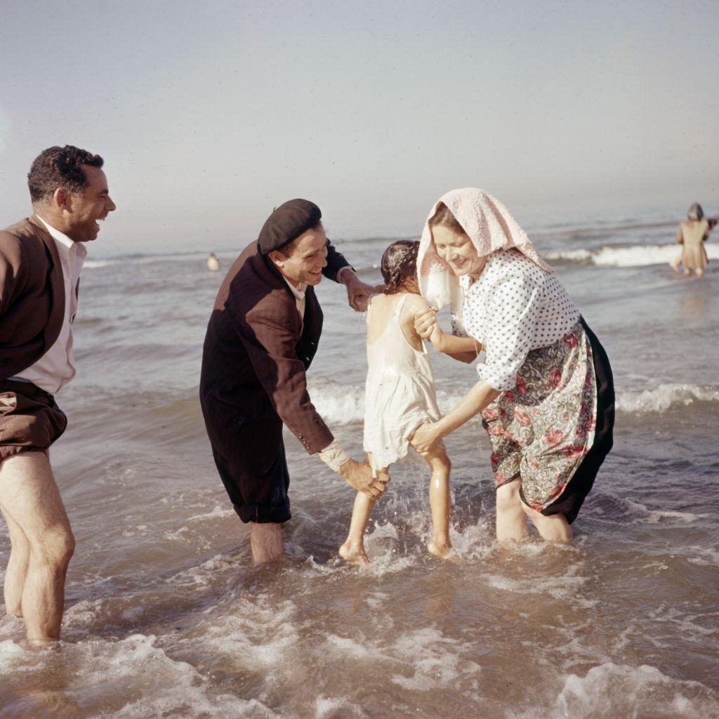 #24 Bathing ritual during a religious festival in Portugal, circa 1970.