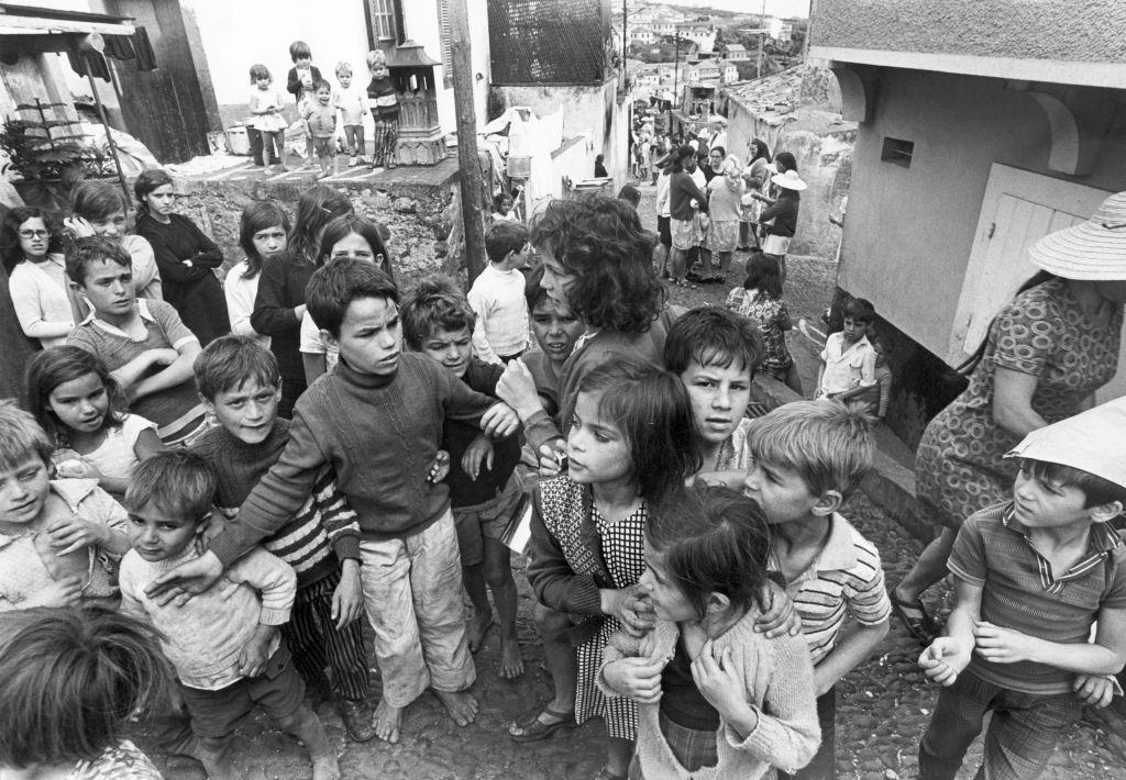 #25 Children in Madeira, boys and girls gathered on a small square, 1971.