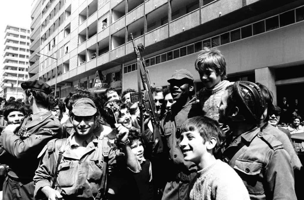 #15 Soldiers on guard in front of the Ministry of Defense at the headquarters of the Junta in 1974 in Lisbon, Portugal.