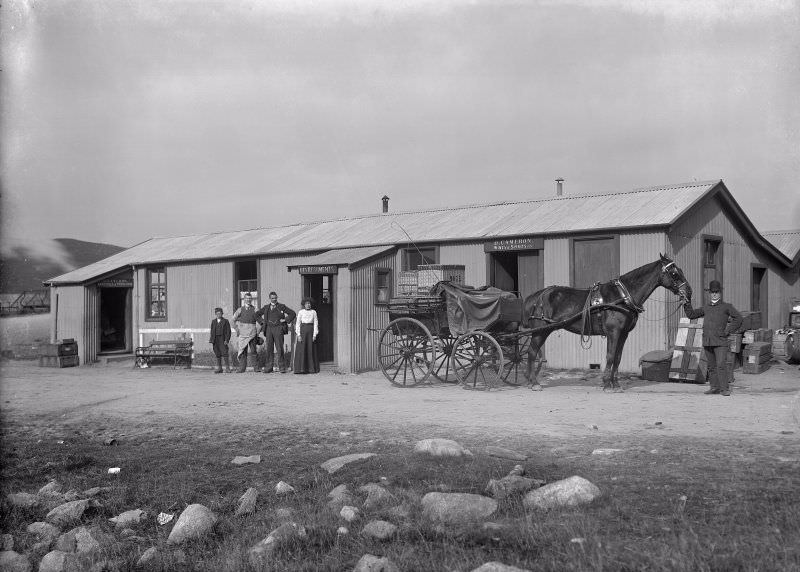 #33 General view of building including horse and cart in foreground outside of ‘D. Cameron, Groceries & Provisions, Refreshments and Wines & Spirits,’ 1904. Possibly business of Duncan Cameron located near Rannoch Station or Kinloch-Rannoch.
