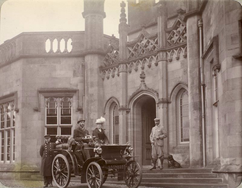 #35 Inchrye Abbey entrance with couple in automobile, c. 1900.