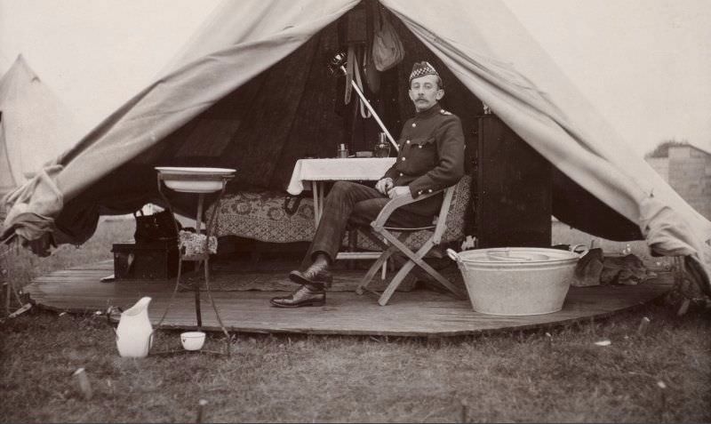#44 Soldier sitting by his tent, c.1904.