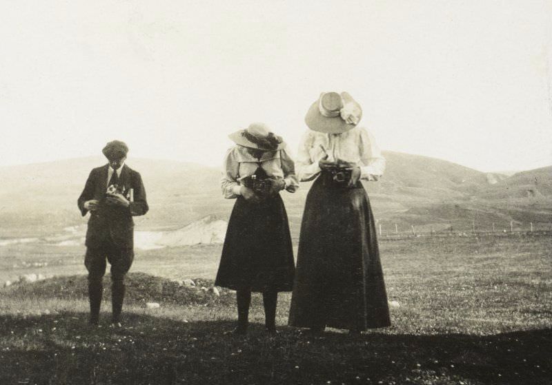 #53 Two women and a man with cameras, 1907. Titled: ‘A Henderson, Gladys Younger, J Henderson’.