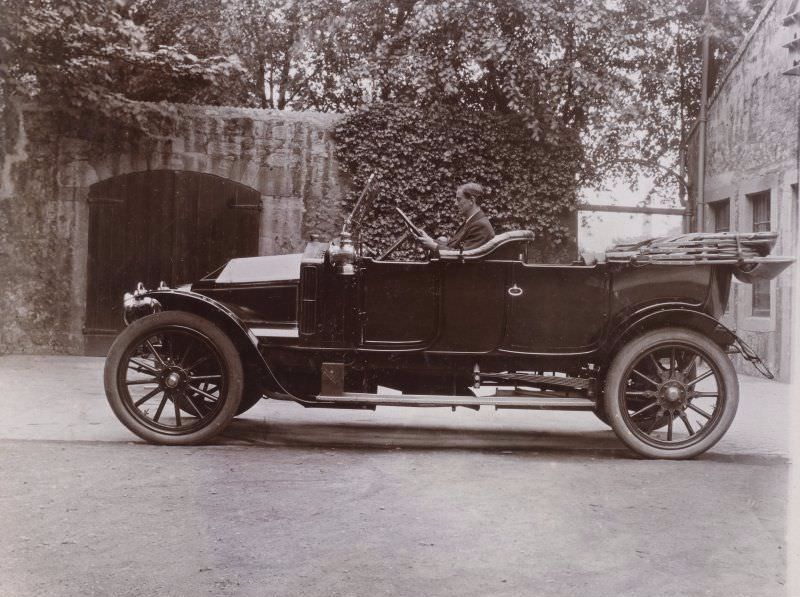 #56 Man in car, 1909.