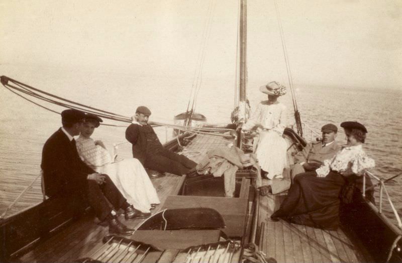 #62 Group on sailing boat, probably ‘Gadfly,’ c.1904. Titled: ‘Sunday afternoon cruise Brodick. Jack Swan, Monty Murray, Johnson family’.
