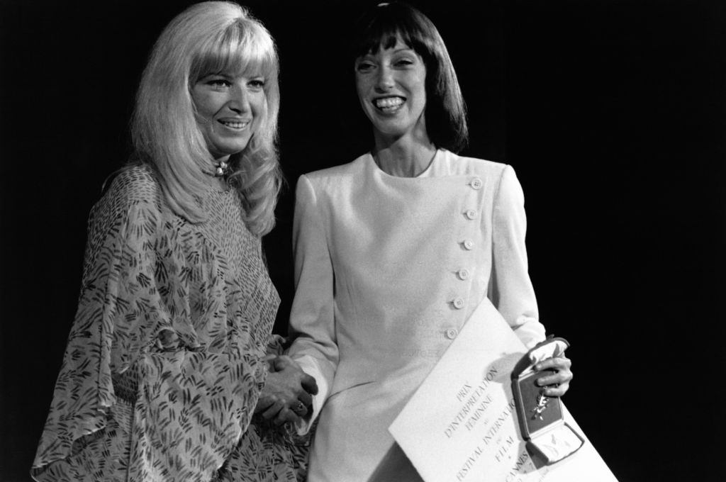 #24 Shelley Duvall receiving the best actress award from Monica Vitti, 1977.