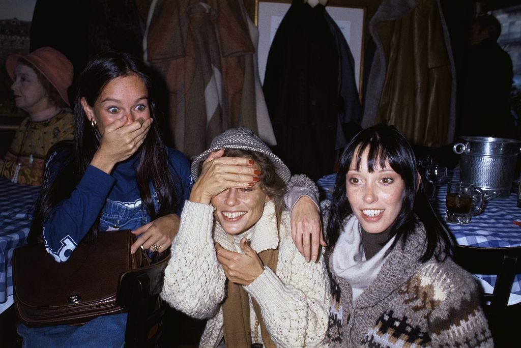#32 Shelley Duvall with Geraldine Chaplin and Lauren Hutton at a party honoring film director Robert Altman, 1977.