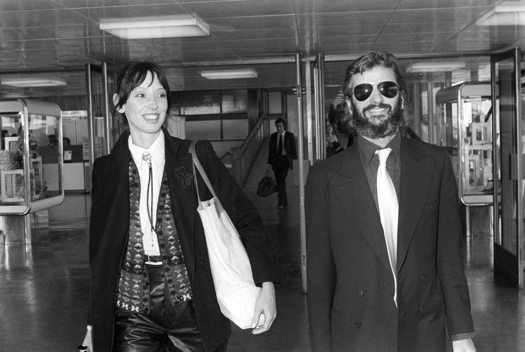 #7 Shelley Duvall with Beatles drummer Ringo Starr at Heathrow Airport in London, 1978.