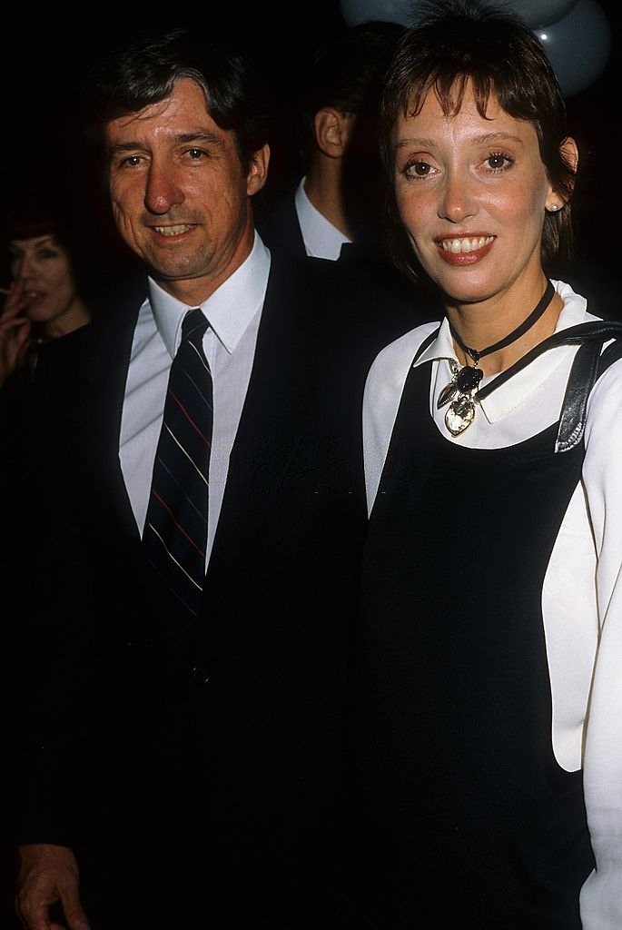 #47 Shelley Duvall with activist Tom Hayden, 1985.