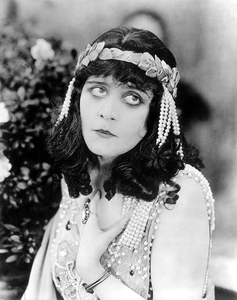 #25 Theda Bara wearing a costume on the set of Salome, 1918.