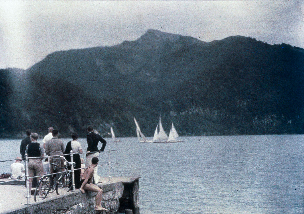 #25 People watching a yachting race.c. 1925