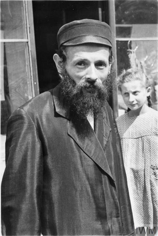 #27 A Jewish man posing for the camera.