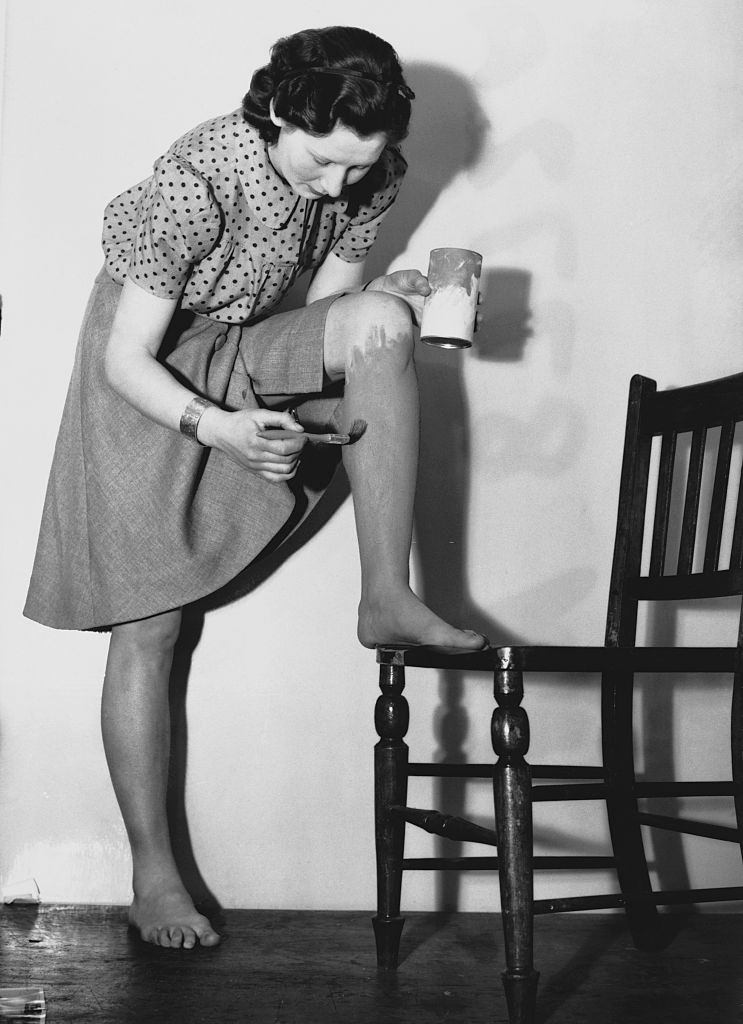 #17 A woman in the United Kingdom paints her legs with dark paint so that it appears as though she is wearing stockings.