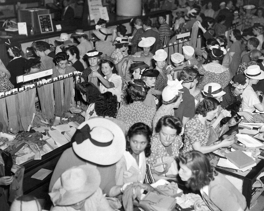 #5 Crowds of women are buying silk stockings at Gimbels Department store in anticipation of a wartime silk shortage, New York. 1941