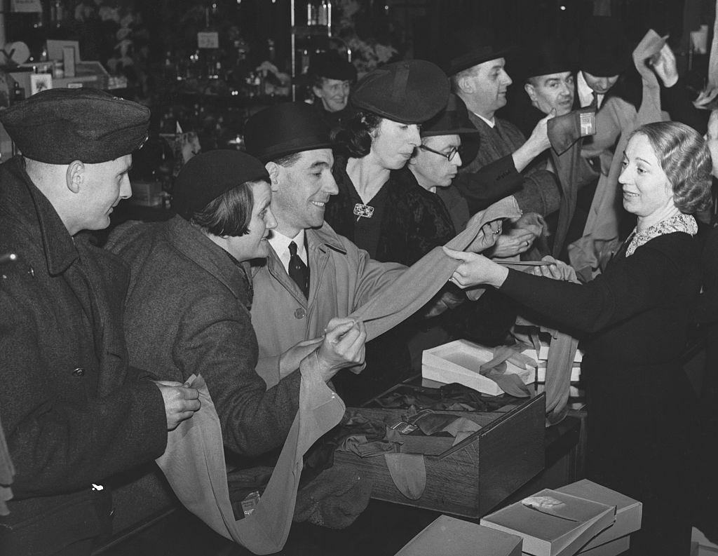 #6 Men buying stockings for their wives and girlfriends during World War II.