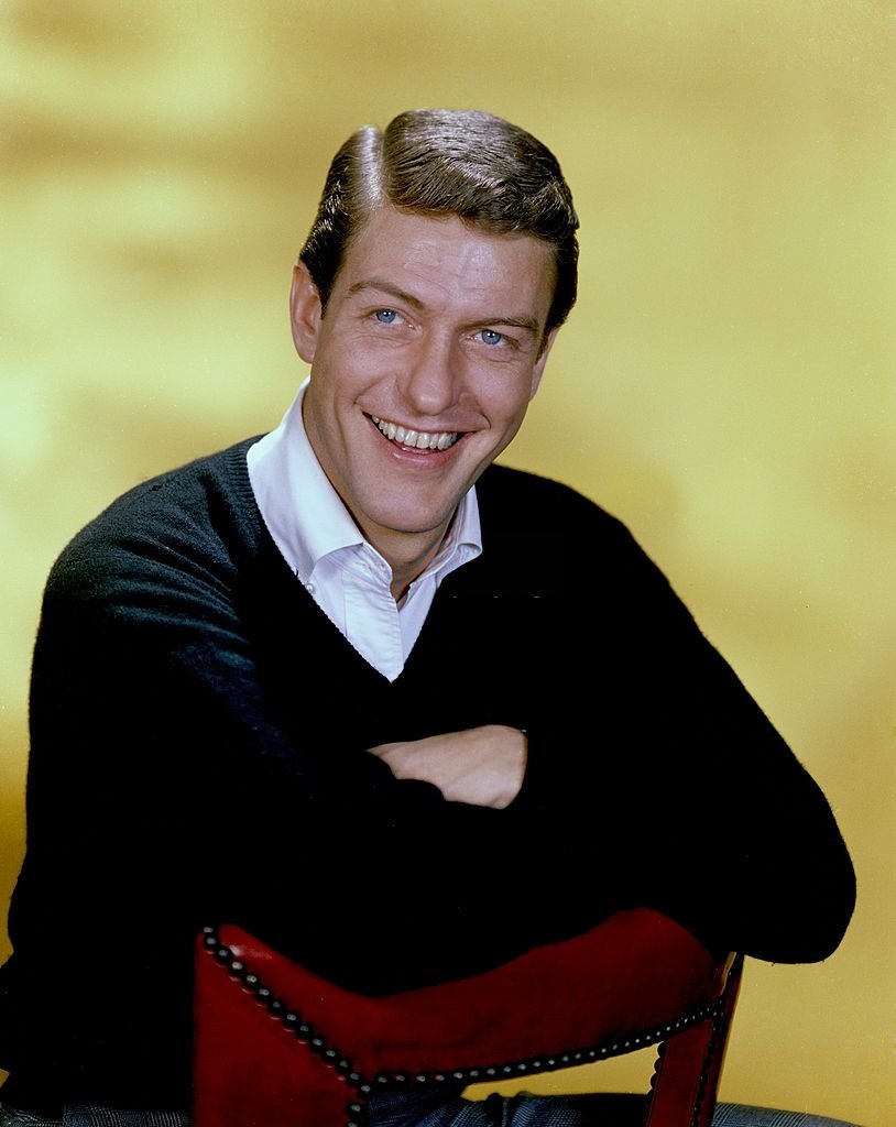 #2 Young Dick Van Dyke posing on a chair, 1960s.