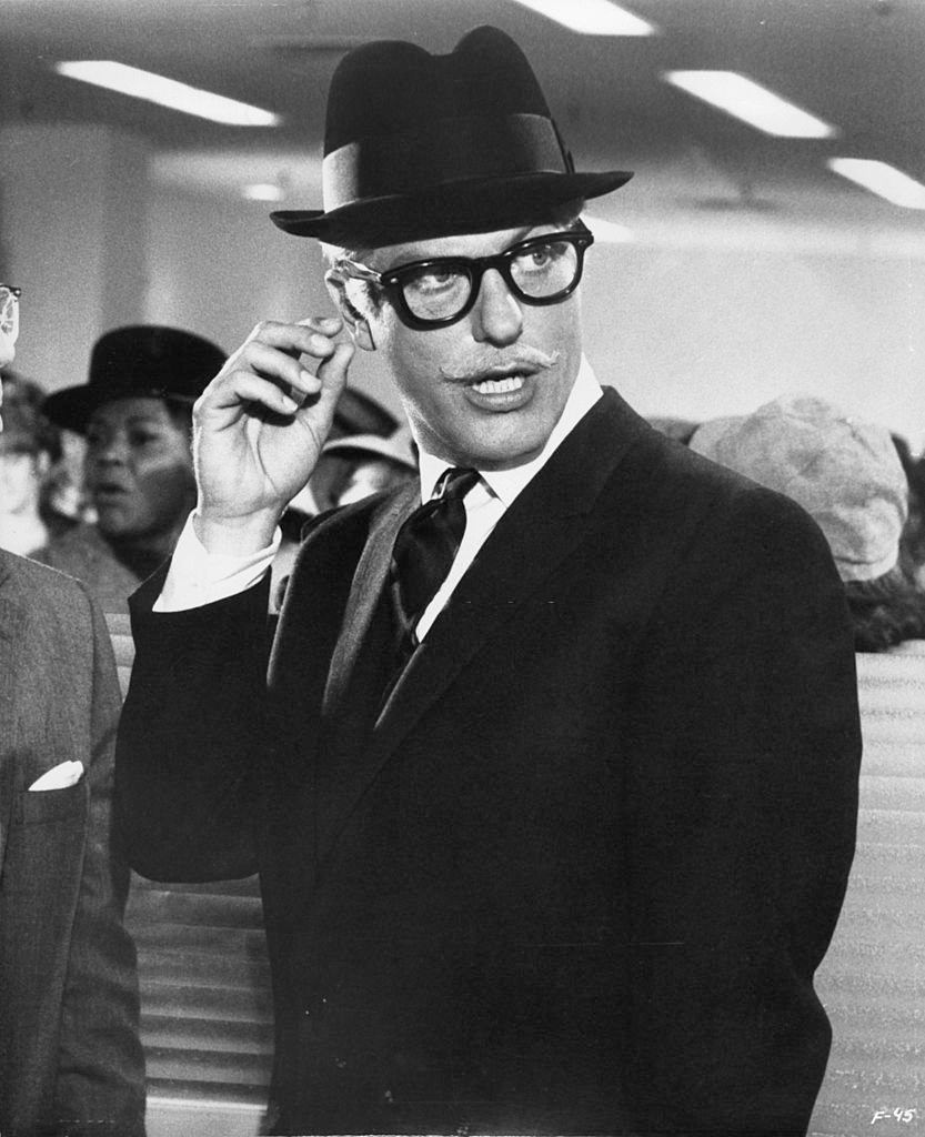 #28 Dick Van Dyke disguises himself in a scene from the film ‘Fitzwilly’, 1967.