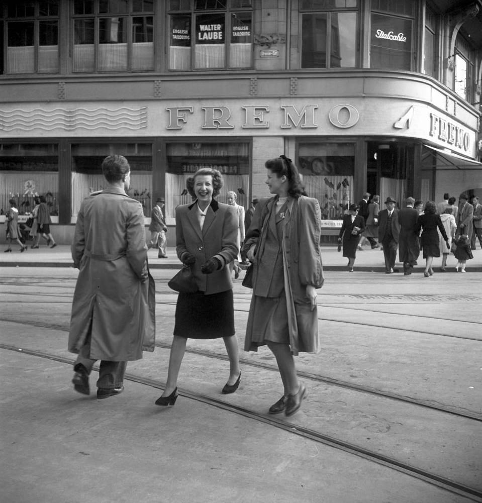 #41 Women walking on a street in Zurich, 1950.