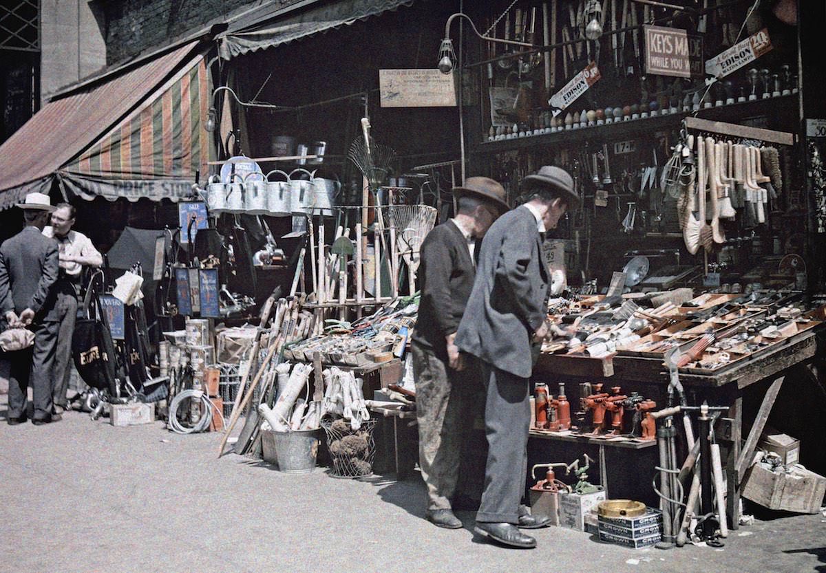 #10 New Yorkers browse the assortment of goods sold along city streets.
